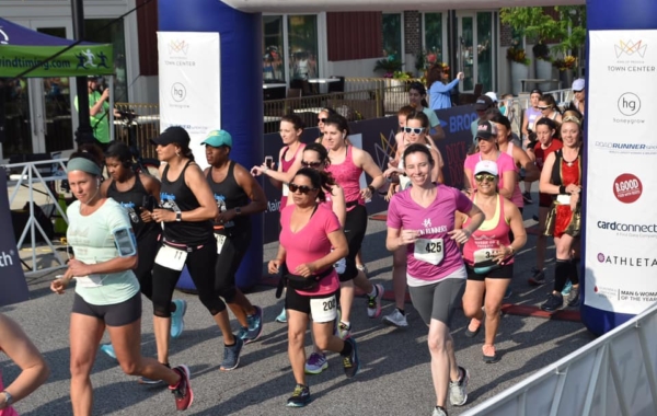 Group of people wearing pink running