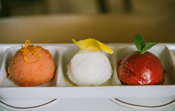 three scoops of sorbet in a dish
