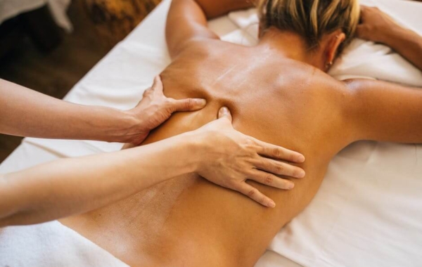 woman getting massaged on massage table